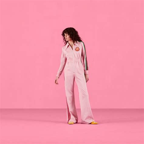 gucci pink jumpsuit.